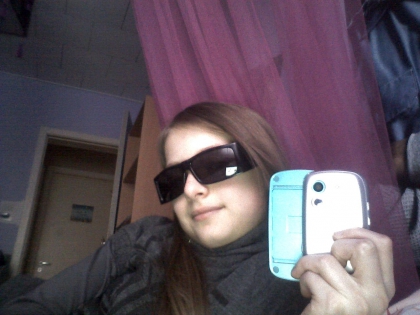 moi avec mes lunette et mon gsm