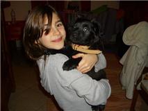 une photo de moi et le chien de ma soeur